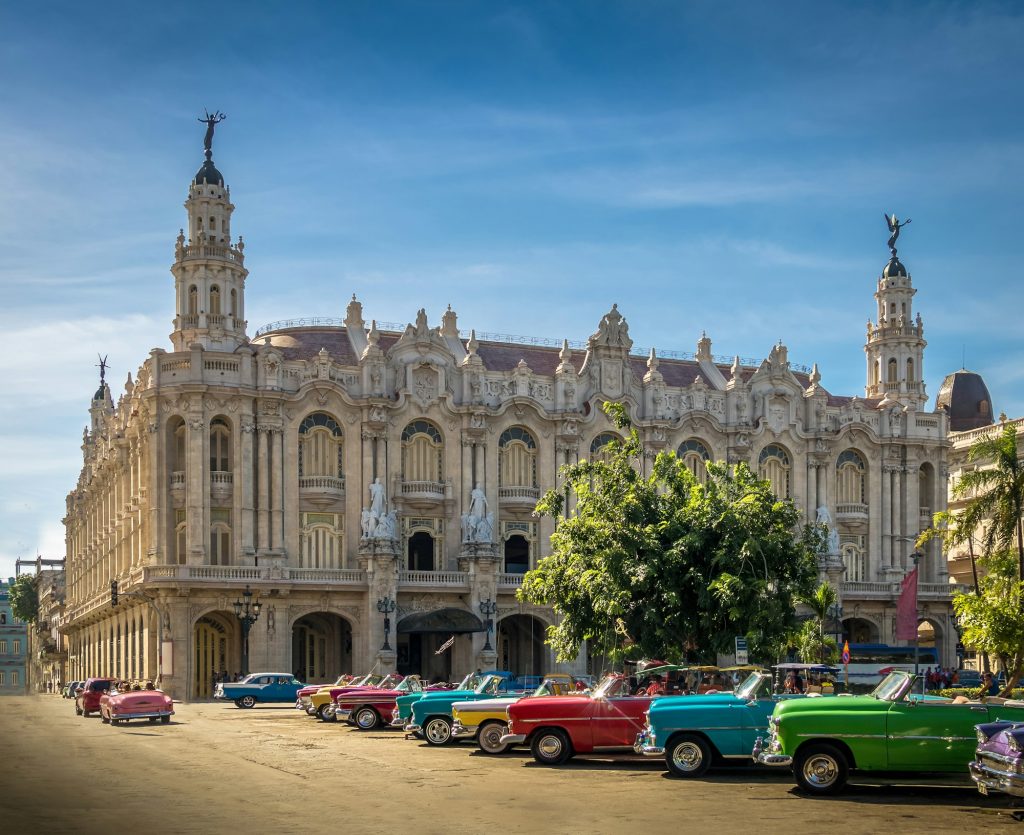 Cuban colorful vintage cars in front of the Gran Teatro - Havana, Cuba
