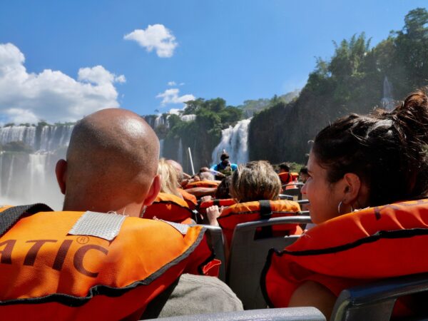 People from behind wearing lifesaving vest